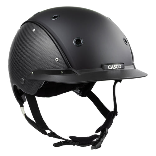 A mat black equestrian riding CASCO helmet made with mat carbon side panel, 3/4 front view against white background 
