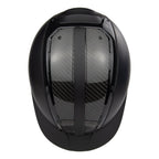 A black mat equestrian riding CASCO helmet with shiny top carbon parts, top view against white background