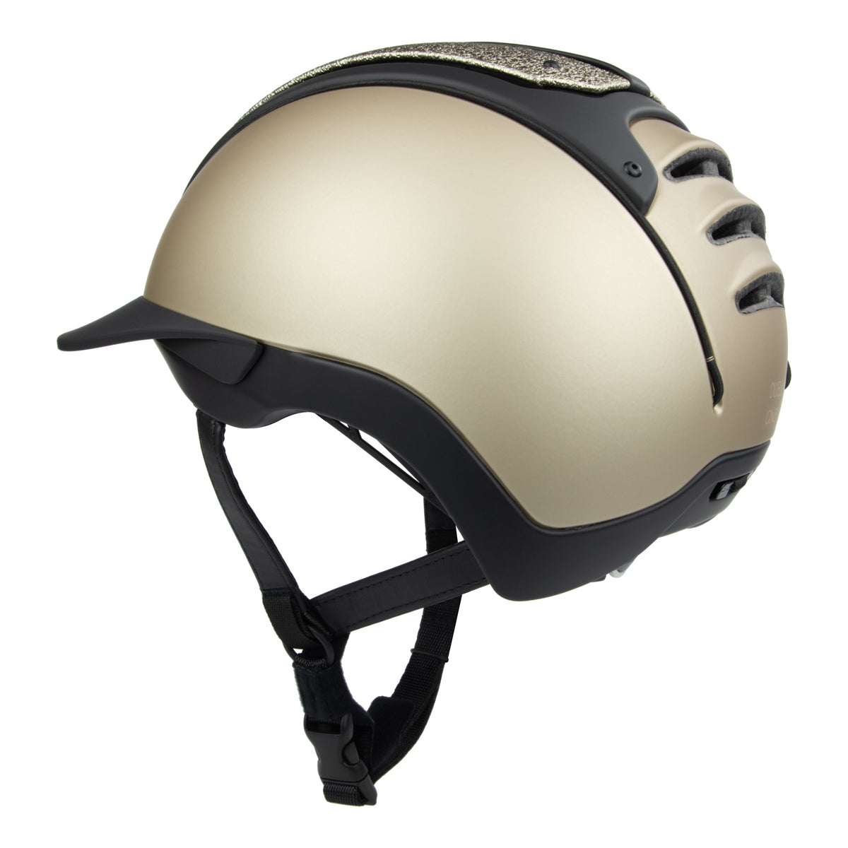 A 3/4 rear view of the equestrian riding Casco helmet,Champagne and black contrast finish with nubuck leather detailing, black strap 