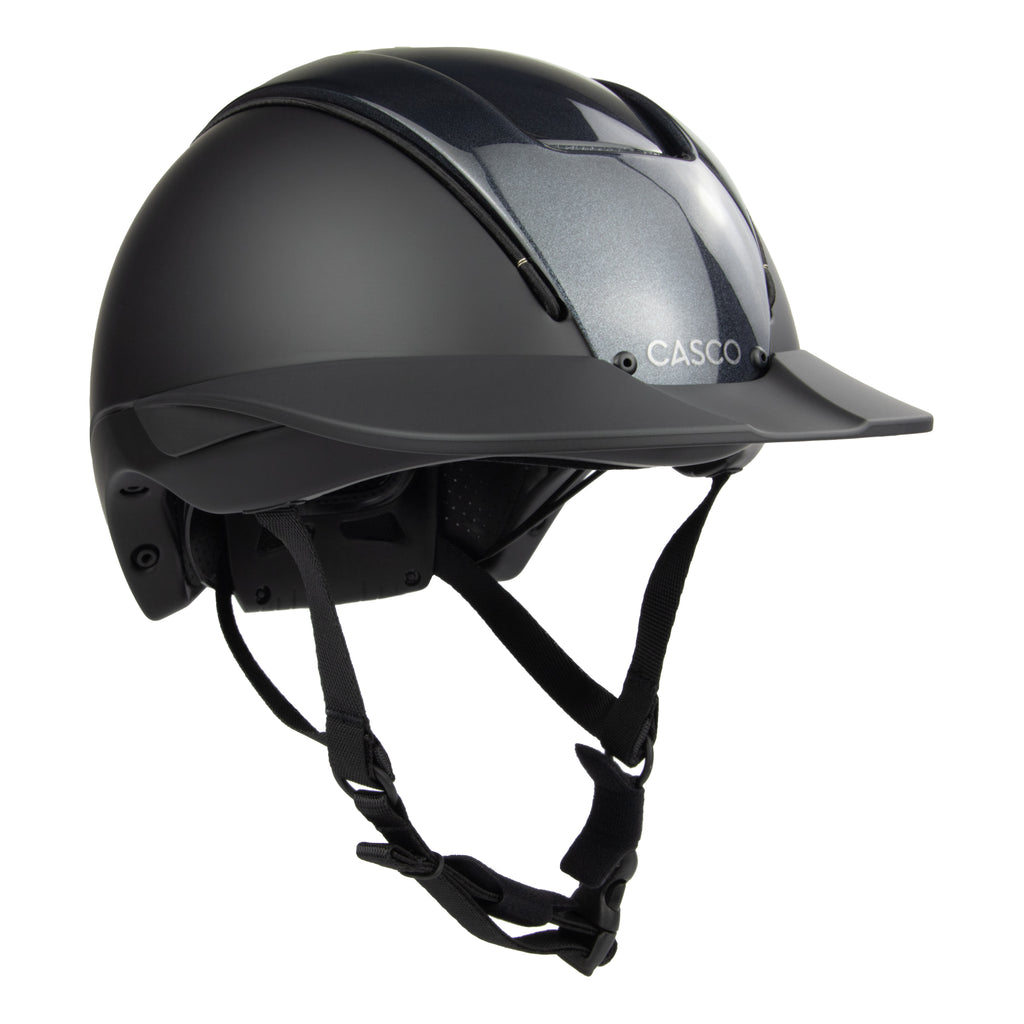 A matte black Casco equestrian riding helmet with a glossy visor and black chin straps, shown from a three-quarters angle on a white background.