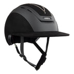 Front 3/4 view of A black Casco equestrian riding helmet with a matching visor, matte finish, brushed nubuck leather with Swarovski crystals and adjustable chin strap, shown on a solid white background.