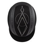 Top view of A black Casco equestrian riding helmet with a matching visor, matte finish, brushed nubuck leather with Swarovski crystals and adjustable chin strap, shown on a solid white background.