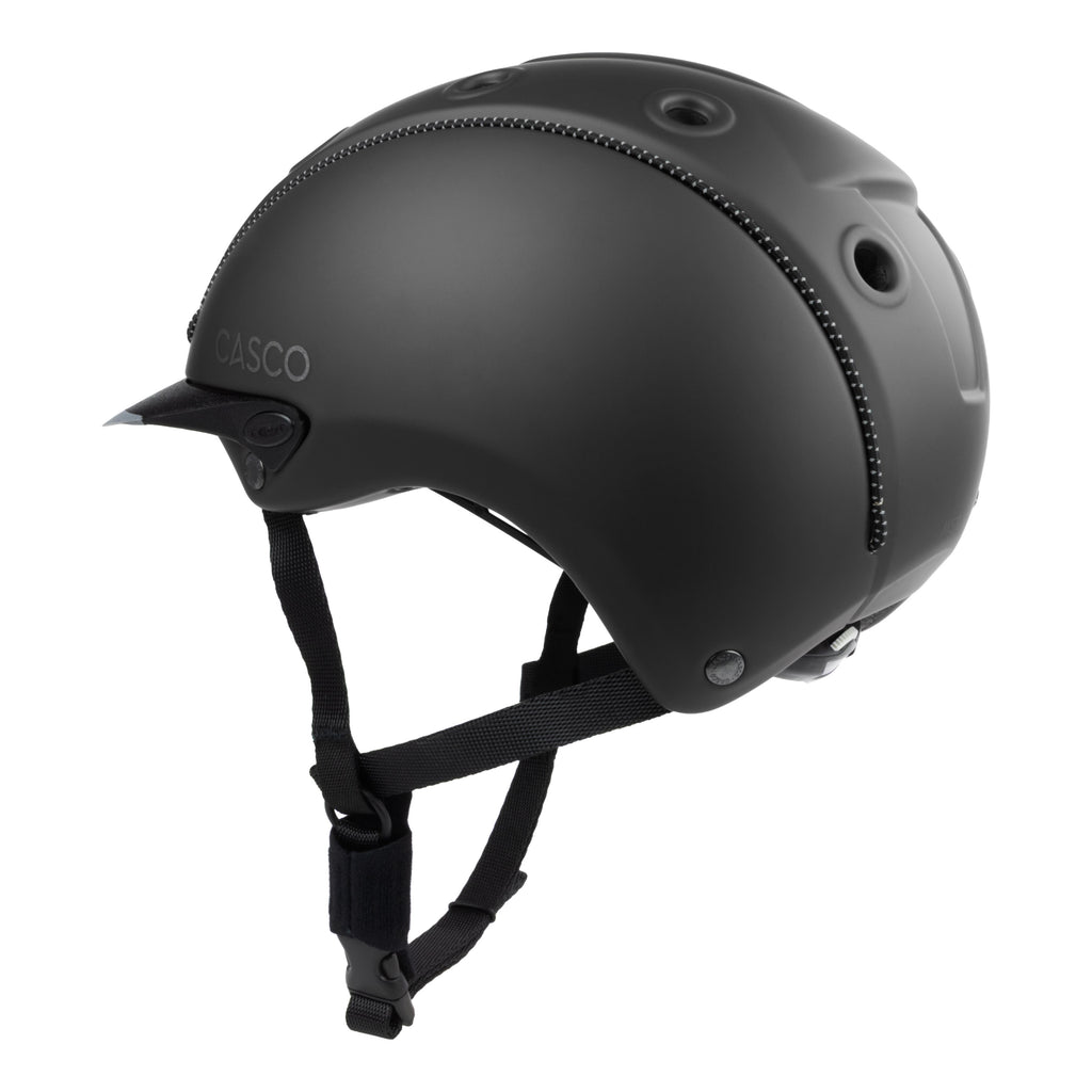 A matte black Casco equestrian helmet with a matching black chin strap, shown from a three-quarters angle against a solid white background.