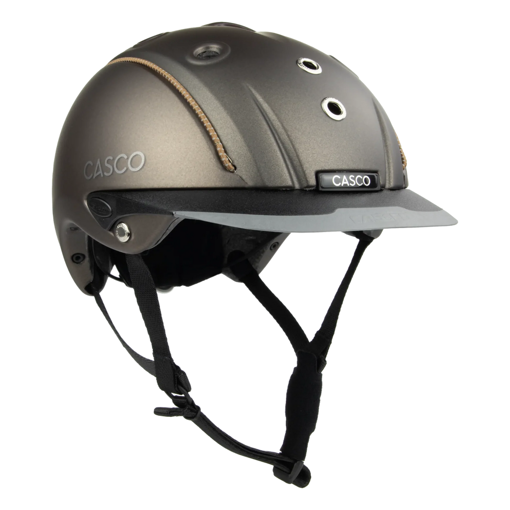 3/4 front view A matte brown equestrian riding Casco helmet with a matching visor, black chin straps, and subtle tan stitching details, shown on a plain white background.