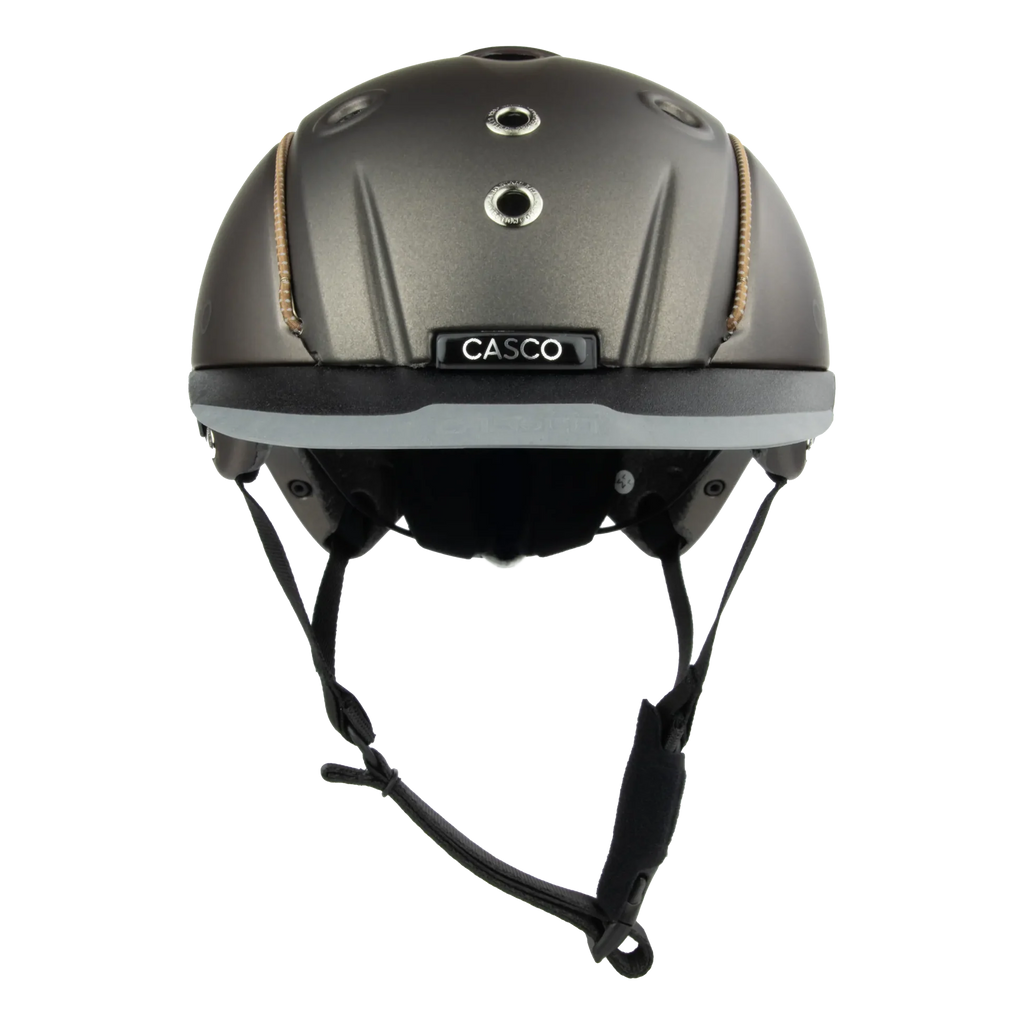 front view A matte brown equestrian riding Casco helmet with a matching visor, black chin straps, and subtle tan stitching details, shown on a plain white background.