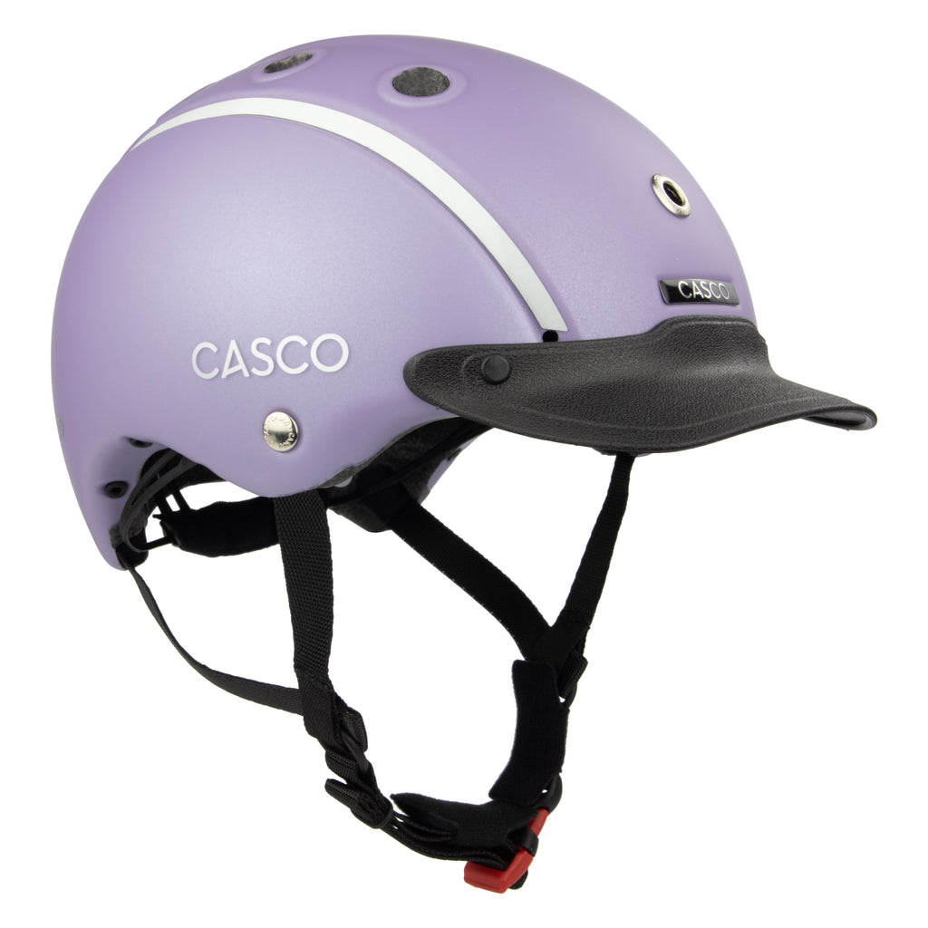 A matte lavender purple Casco equestrian helmet with a black visor and black chin straps, featuring a white stripe detail on the top, shown against a plain white background.
