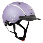 A matte lavender purple Casco equestrian helmet with a black visor and black chin straps, featuring a white stripe detail on the top, shown against a plain white background.