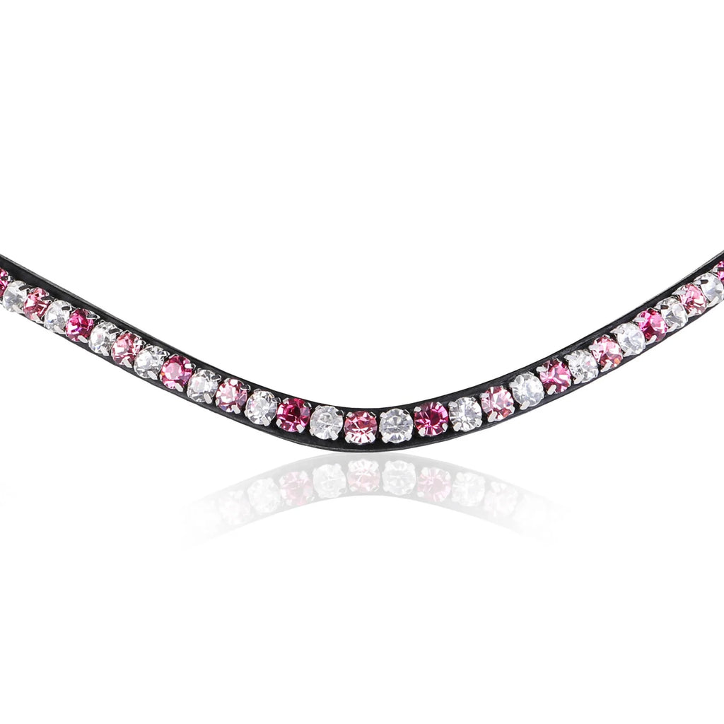 Closeup of The Paloma browband featuring Austrian stellux crystals that alternates a pattern of soft pink, clear and watermelon pink creating the perfect pink tone.