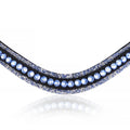 A closeup of The Paris browband — premium leather with baby blue glitter and  baby blue crystals in a wide, 2cm-deep design .