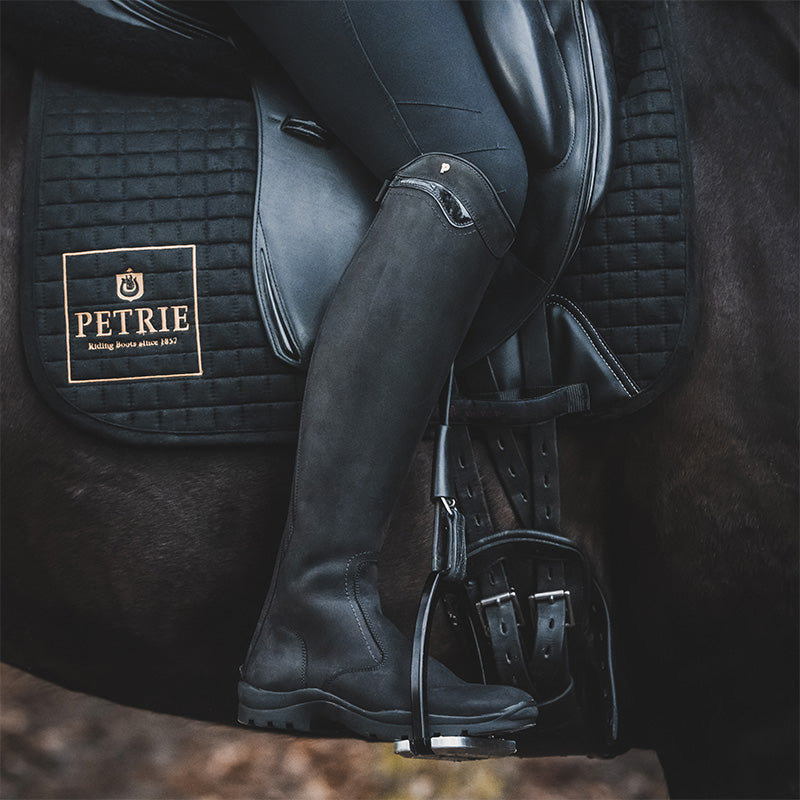 Petrie Explorer black nubuck riding boos — lifestyle riding a horse