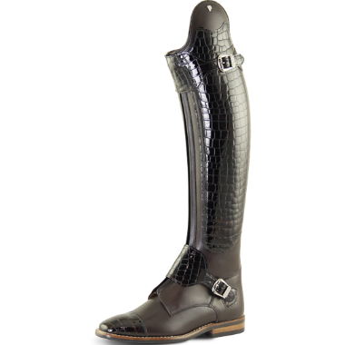 A single tall Petrie equestrian riding boot in dark brown leather with a glossy crocodile-embossed texture on the shaft, featuring silver buckle straps and a low brown leather heel, shown against a plain white background.